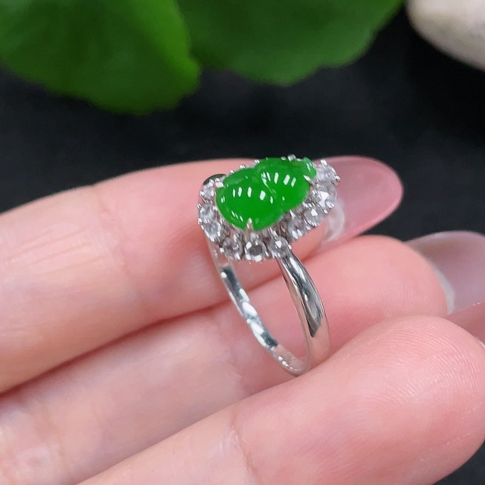 Huiliu certified jadeite inlaid ring with diamond accents, showcasing intricate craftsmanship and elegant design.