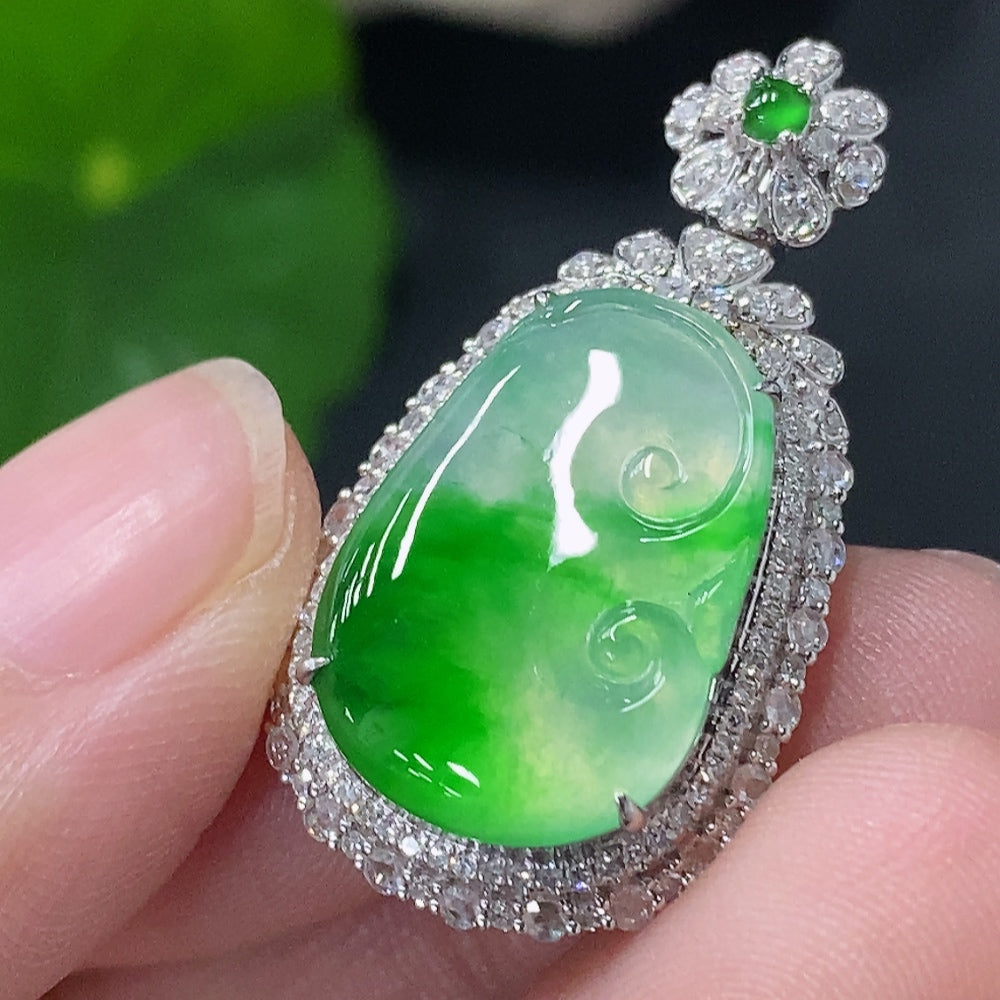 HUILIU HQ jadeite Ruyi pendant in 18k gold with diamond accents, showcasing intricate inlaid design and polished surface.