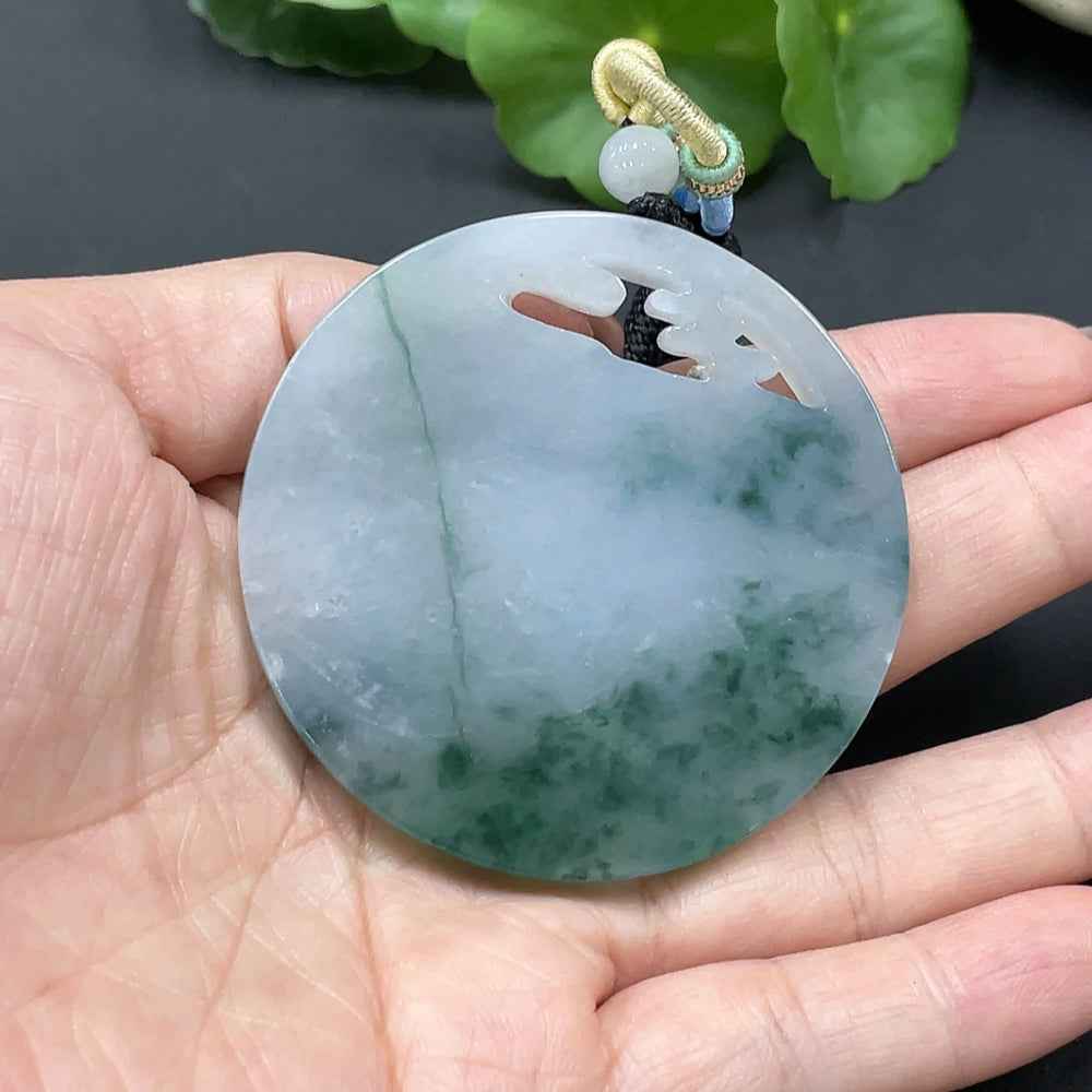 Jadeite landscape pendant from HUILIU HQ with a gross weight of 52.048g, featuring detailed carved jade imagery.