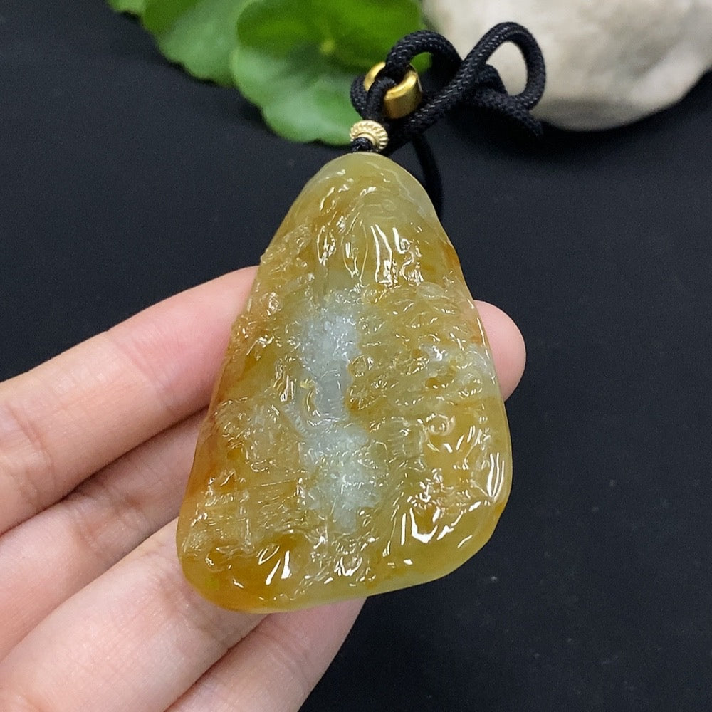 HUILIU HQ jadeite landscape pendant in yellow, showcasing detailed carved scenery, weighs approximately 29.34g, with undetermined origin.