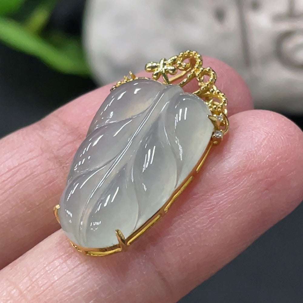 HUILIU HQ jadeite leaf pendant in 18k gold with diamond inlay, featuring a delicate natural jade leaf design.