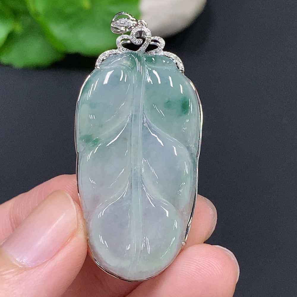 Jadeite leaf pendant with 18k gold from HUILIU HQ, featuring intricate leaf design and total weight of approximately 8.03g.