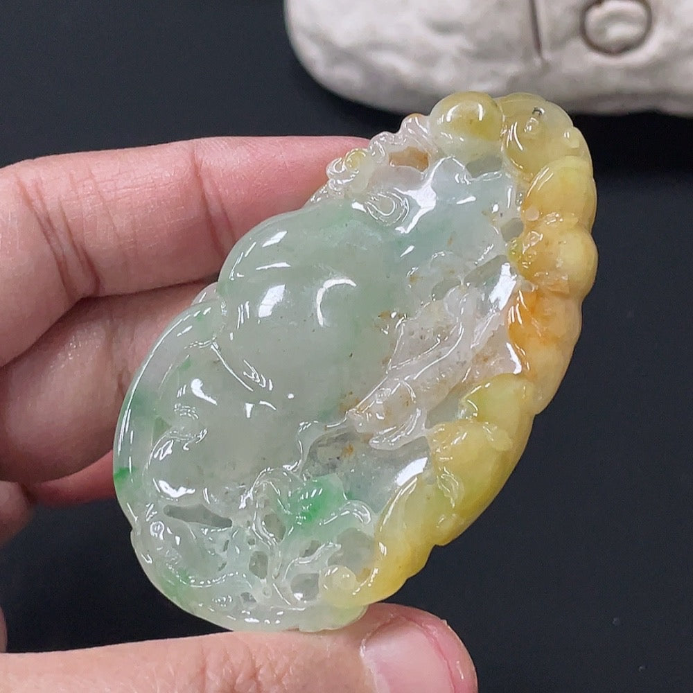 Jadeite Lotus Leaf Fish Pendant in jade, weighing approximately 27.26 grams, with an undetermined color, by HUILIU HQ.