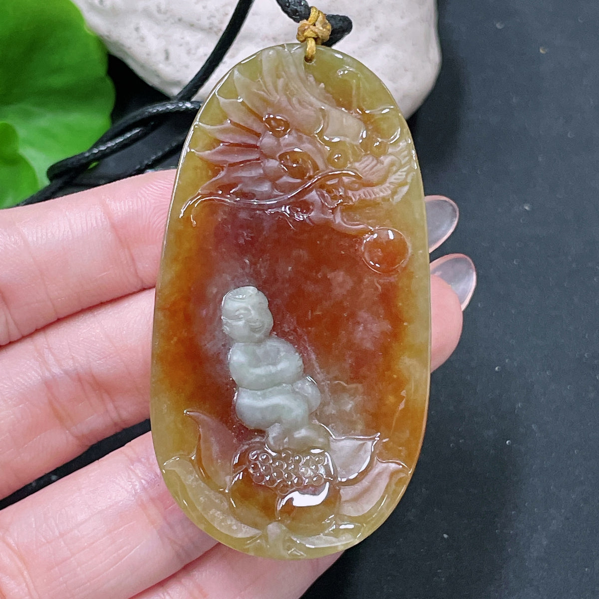 Jadeite lotus pendant with yellow accents, weighing approx. 36.65g, from HUILIU HQ, featuring intricate jade craftsmanship.
