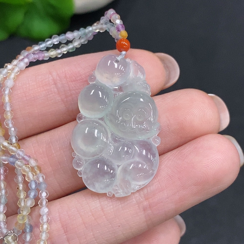 Huiliu Certified Jadeite Monkey Presenting Longevity Pendant with non-jadeite chain and rope, showcasing detailed jade craftsmanship.