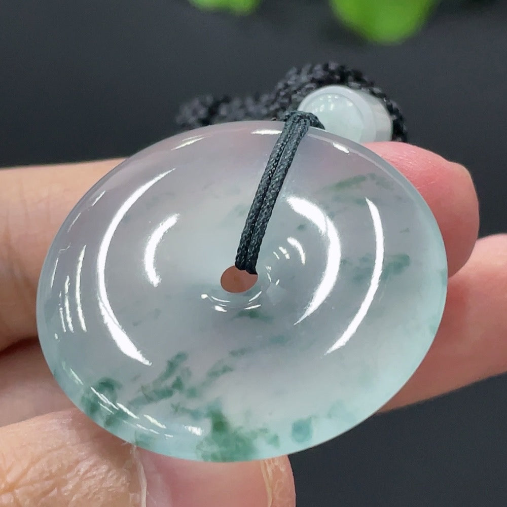 Jadeite Peace Knot pendant from HUILIU HQ, crafted from green jade, weighs approximately 19.4g, featuring a traditional knot design.