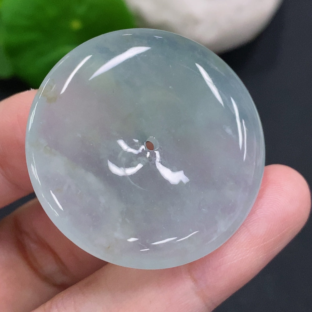 HUILIU HQ jadeite peace knot pendant, approximately 16.4g, showcasing intricate craftsmanship and smooth green jade surface.