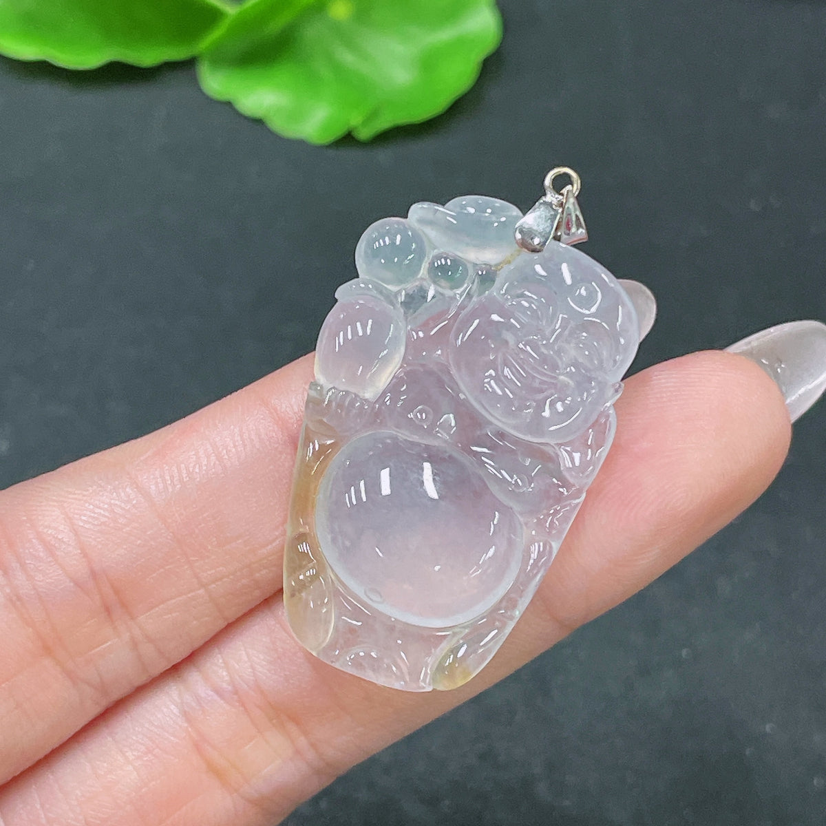 HUILIU HQ Jadeite Buddha pendant with 18k gold bezel, approximately 8.08g, showcasing intricate craftsmanship and vibrant green jade.