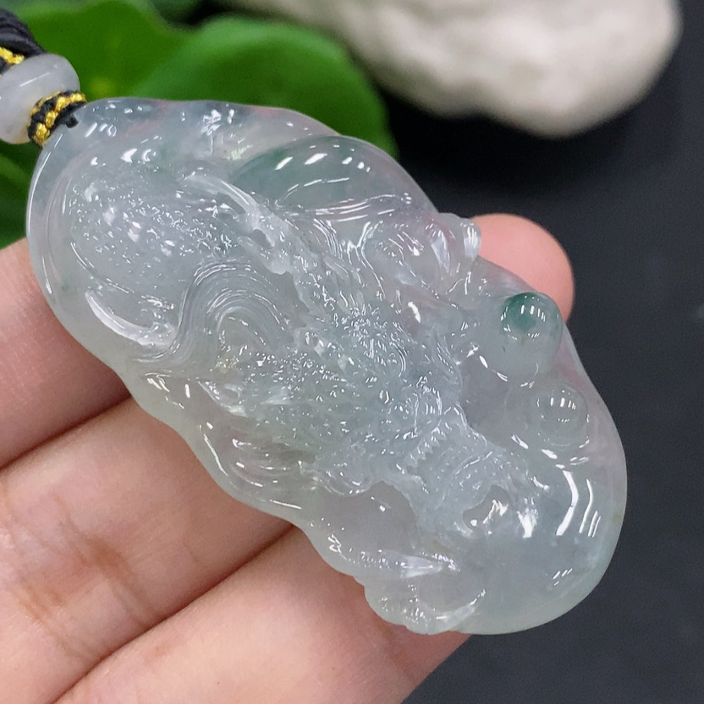 HUILIU HQ jadeite pendant with dragon plaque on cord, approximately 27.4g, showcasing detailed jade carving and smooth finish.