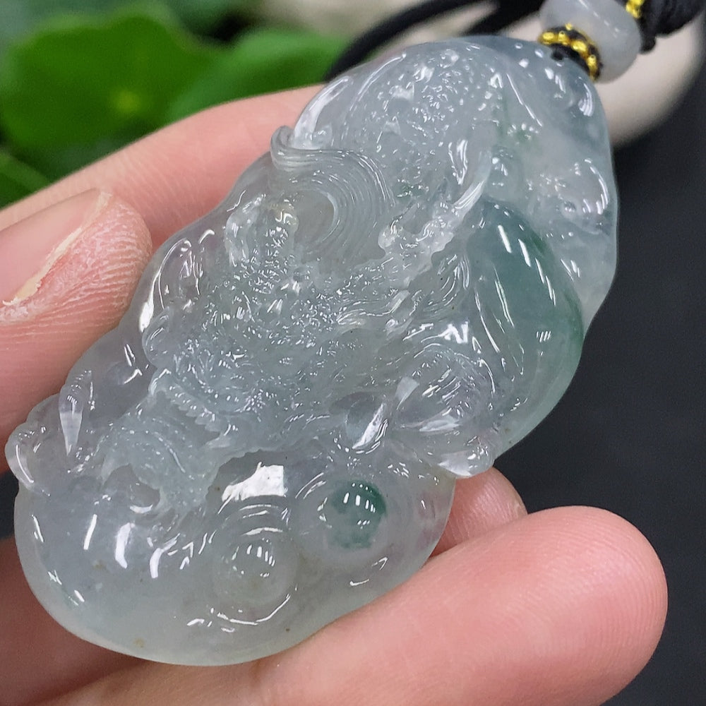 Jadeite pendant featuring a dragon plaque with cord, crafted by HUILIU HQ, weighs approximately 27.4g.
