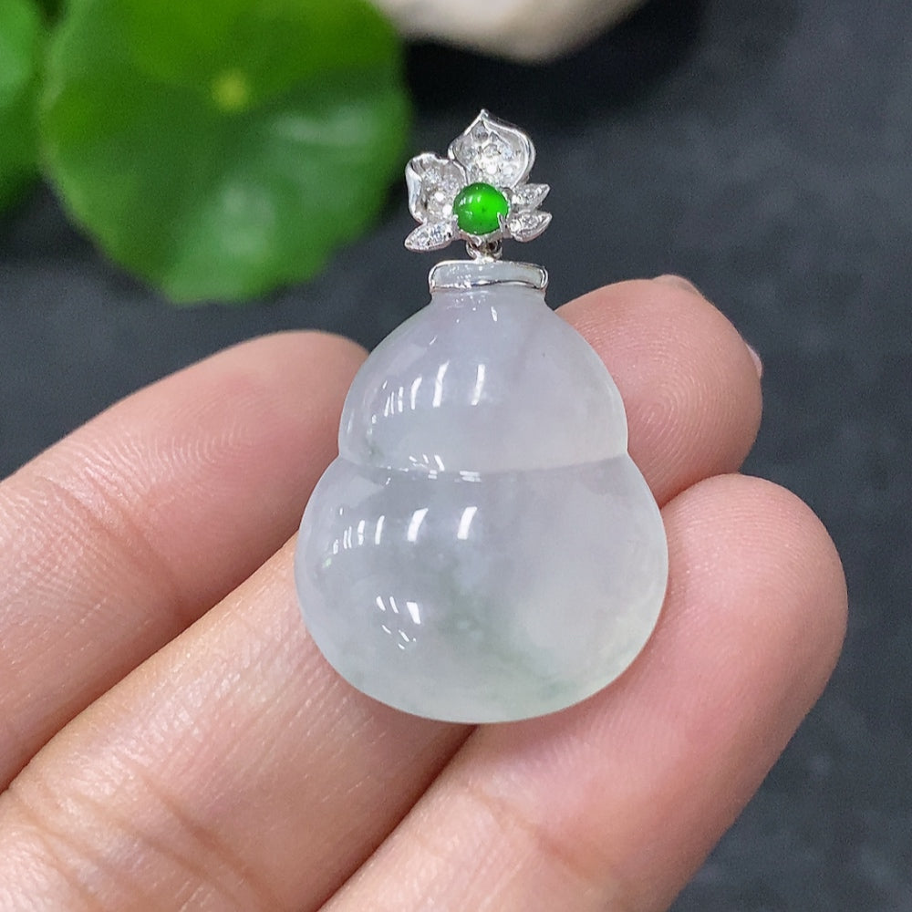 Huiliu HQ jadeite pendant in gourd shape, crafted from natural jade, certified by Huiliu, showcasing smooth, polished surface.