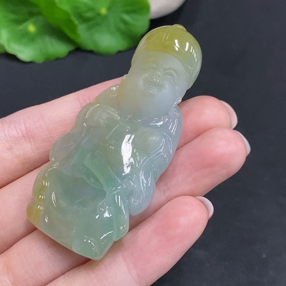 Huiliu HQ jadeite pendant with yellow color and undetermined origin, showcasing polished jade surface and certified craftsmanship.