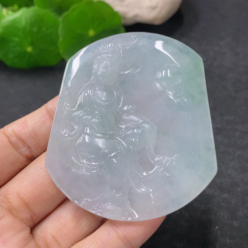 Jadeite Guanyin pendant weighing approx. 40.73g, crafted from green jade stone, featuring detailed religious figure design.