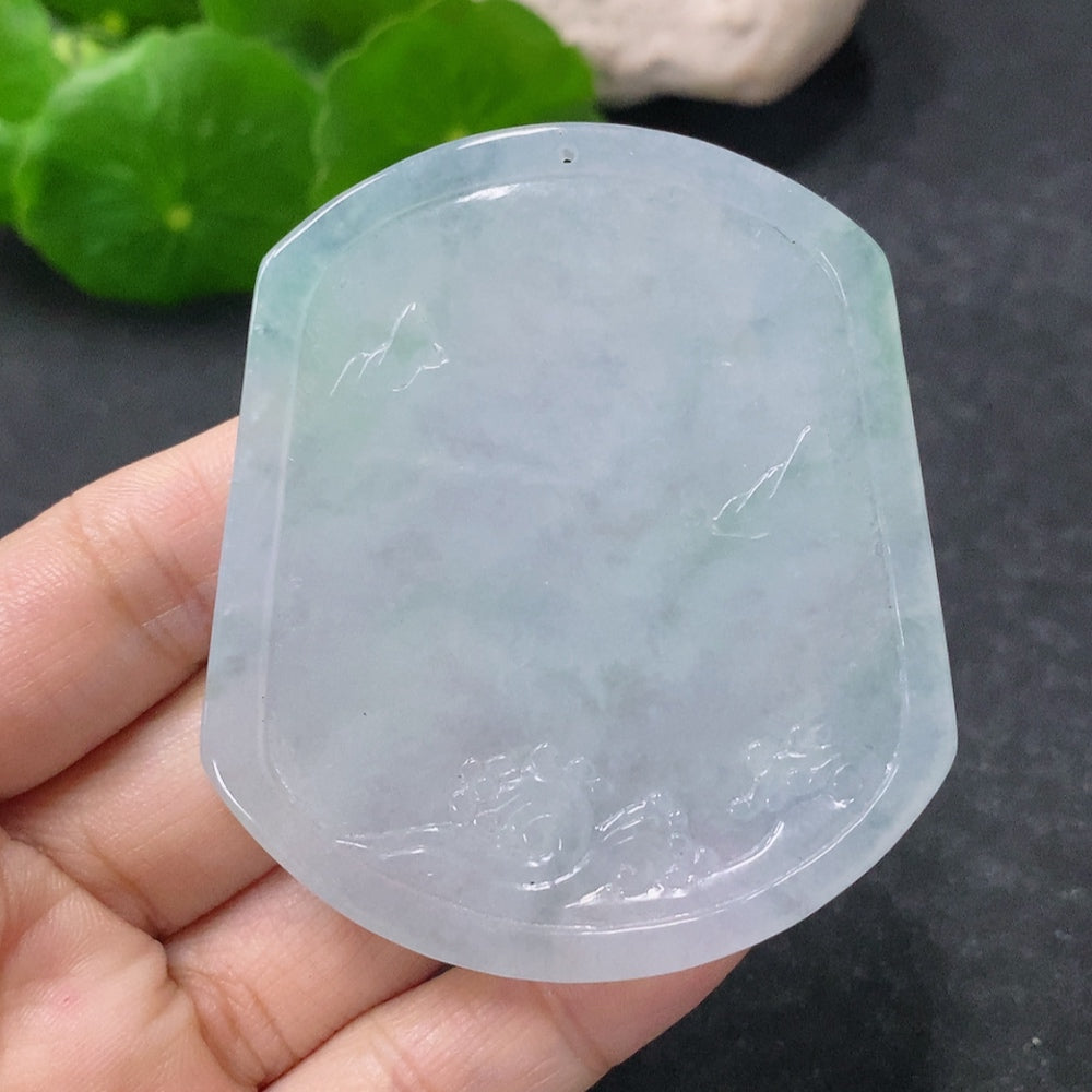 Jadeite Guanyin pendant from HUILIU HQ, carved jade figure weighing approximately 40.73g, showcasing intricate craftsmanship.