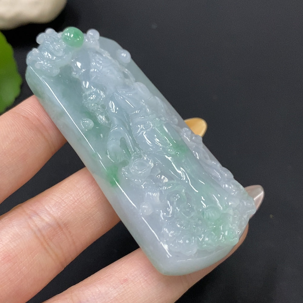 Jadeite pendant featuring Guanyin figure from HUILIU HQ, weighing approximately 58.34g, with intricate jade craftsmanship.