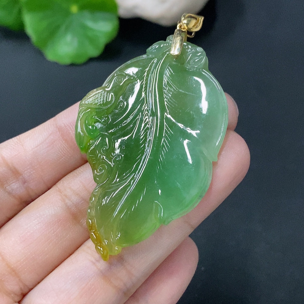 HUILIU HQ jadeite leaf pendant in 18K gold, weighing approximately 14.35g, featuring a detailed jade leaf design.
