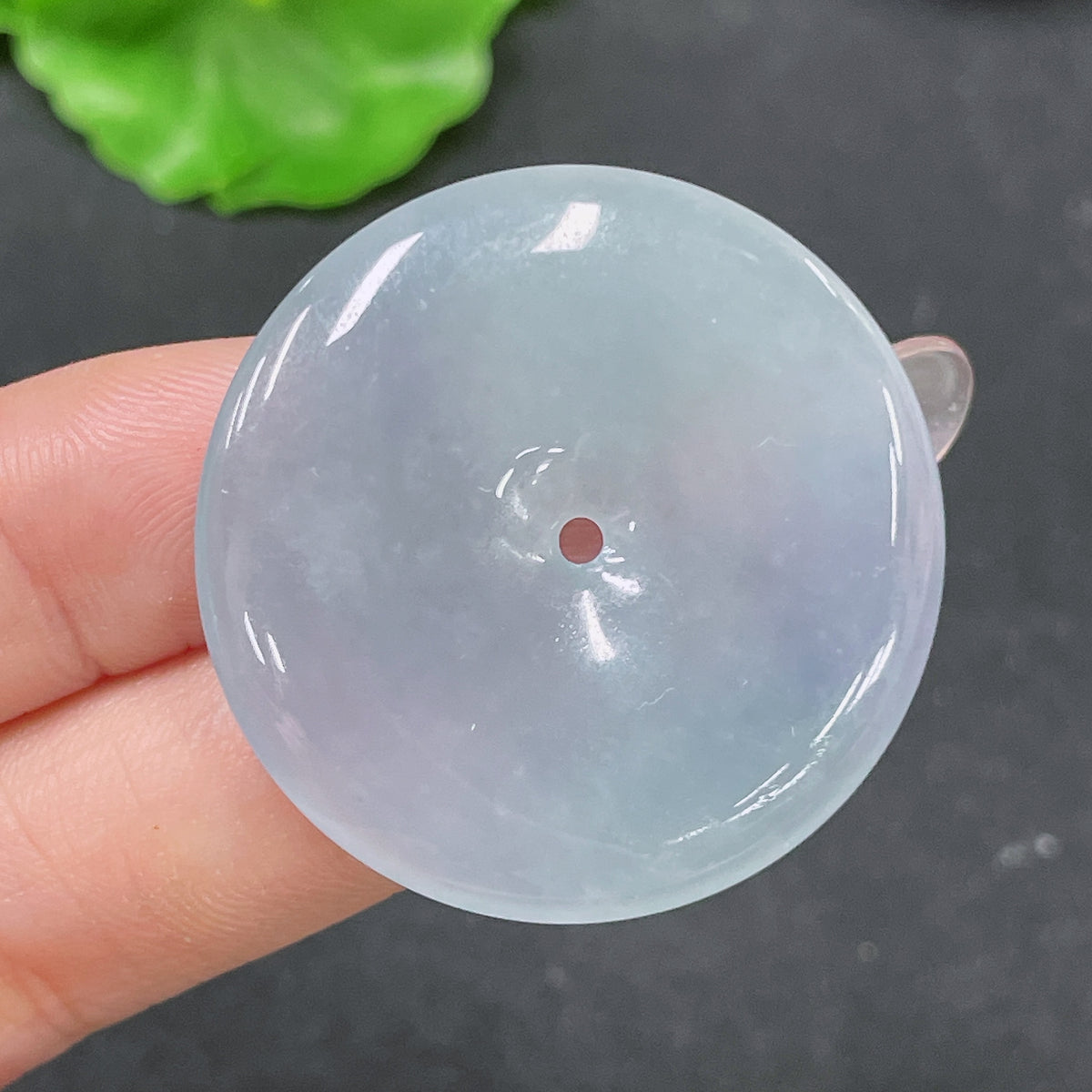Huiliu Jadeite Peace Knot Pendant, approx. 12.5g, featuring intricate design and vibrant green jade, certified by HUILIU HQ.