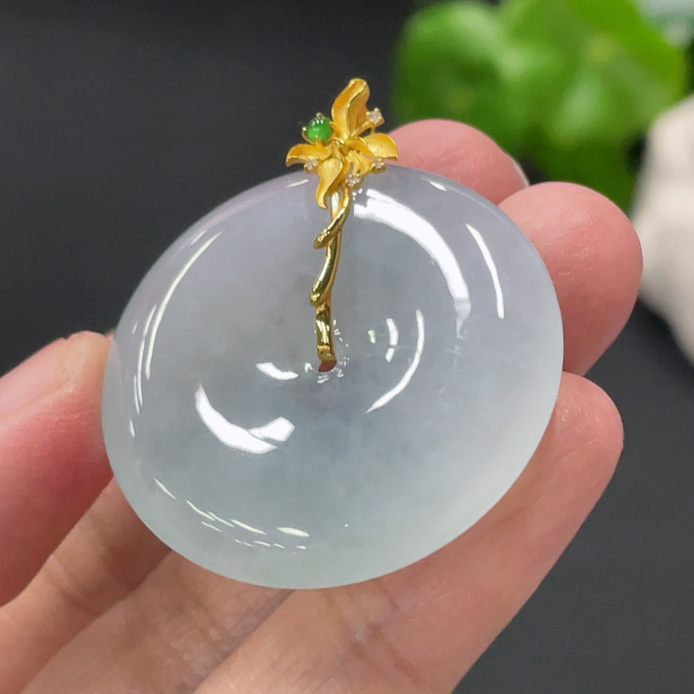 Huiliu jadeite pendant featuring a peace knot design with diamond accents, crafted from high-quality jade by HUILIU HQ.