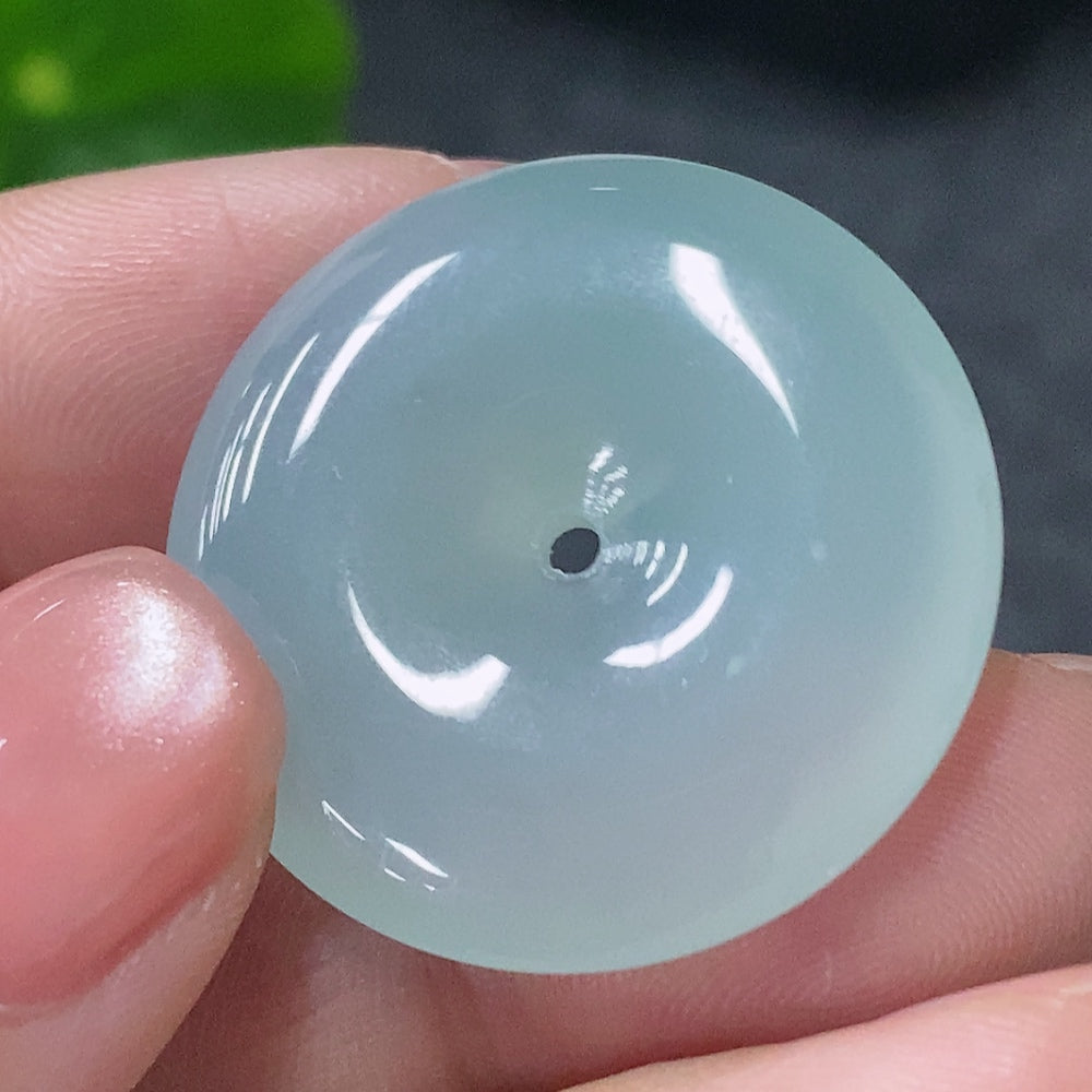 Huiliu certified jadeite peace ring pendant featuring smooth green jade with carved peace symbol design.