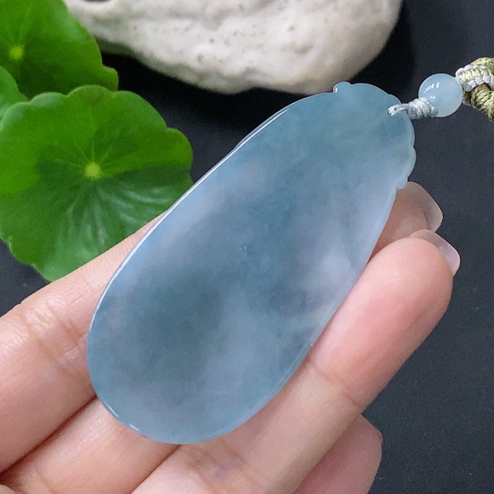 Jadeite pendant Ruyi with rope, HUILIU HQ brand, weighing approximately 20.33g, showcasing smooth green jade and intricate design.