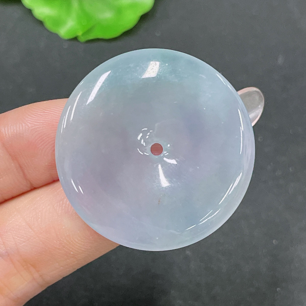 Huiliu HQ jadeite pendant with safety buckle, showcasing polished green jade stone and secure clasp design.