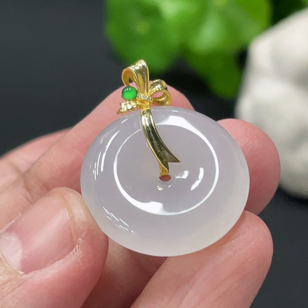 Jadeite pendant with peace knot design, 18K gold accents, diamond details, from HUILIU HQ, lightweight jewelry piece.