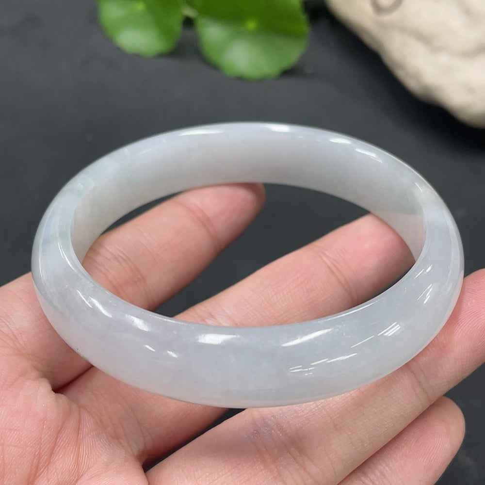 Huiliu HQ jadeite regular bangle made of green jade, showcasing smooth polished surface and traditional craftsmanship.