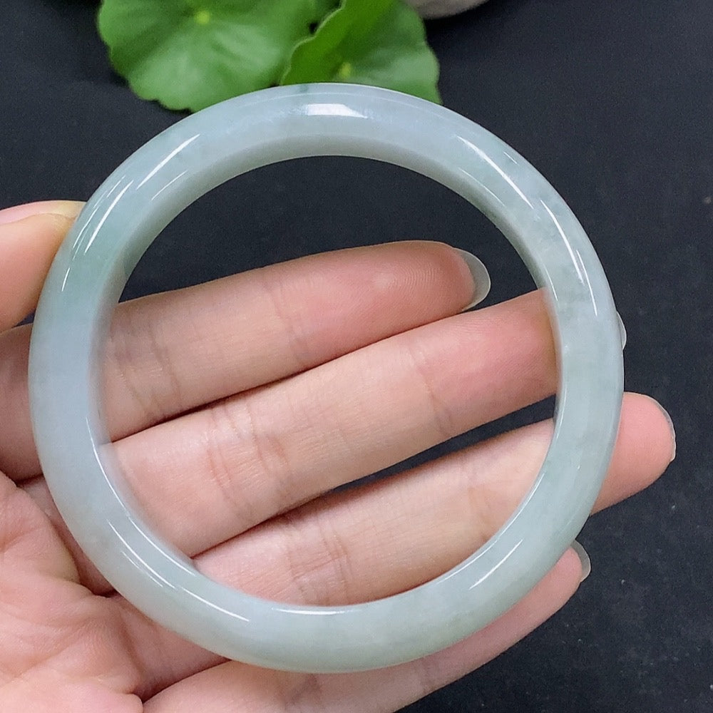 HUILIU HQ jadeite regular bangle with inner diameter 55.8mm and weight 52.13g, showcasing smooth, polished jade surface.