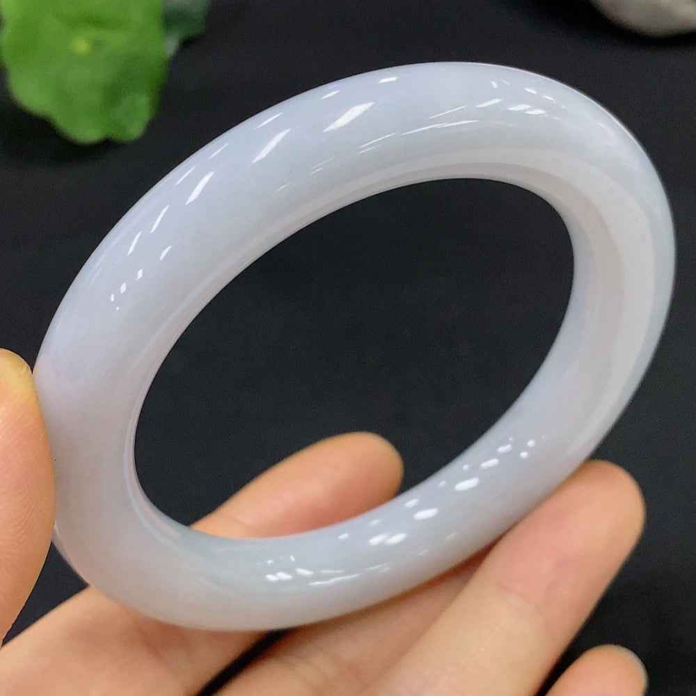 HUILIU HQ jadeite round bangle in size 53.7 with a total weight of 61.412g, showcasing smooth, polished jade surface.