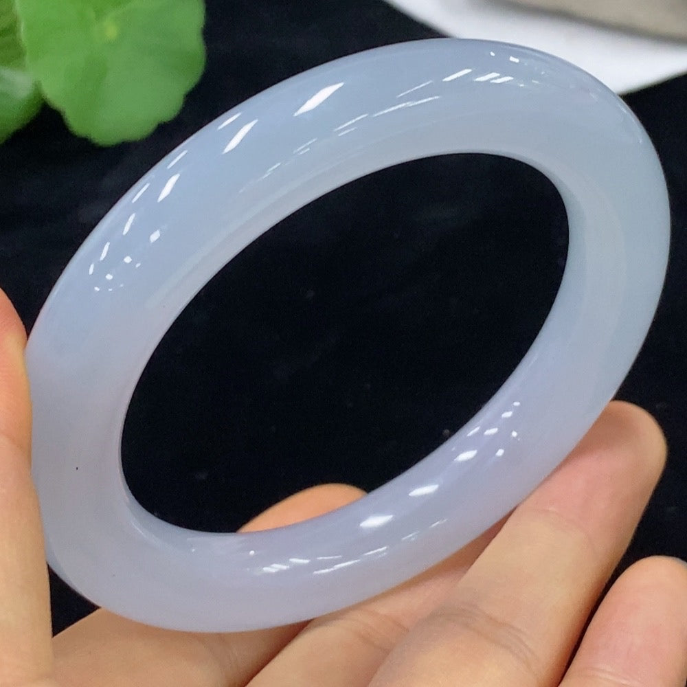 HUILIU HQ jadeite round bangle in size 56.7 with approximately 72.66g weight, showcasing smooth, polished jade surface.