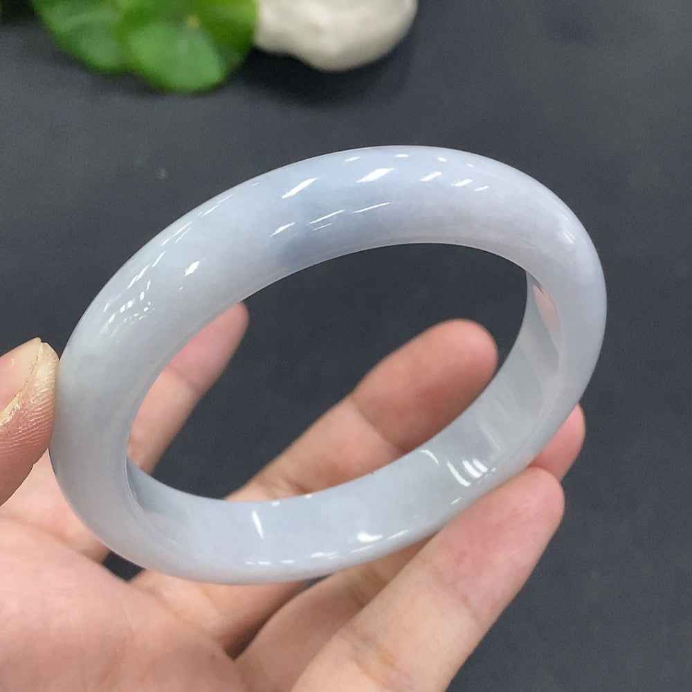 HUILIU HQ jadeite round bangle in size 56, weighing 52.823g, showcasing smooth, polished jade surface and elegant round shape.