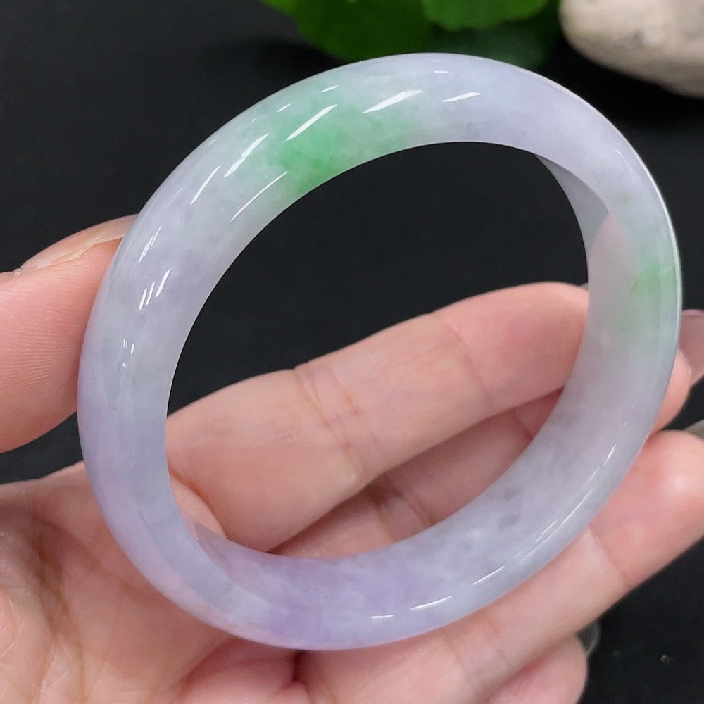 HUILIU HQ jadeite round bangle in size 56, weighing approximately 52.3g, showcasing smooth, polished jadeite with a rounded design.
