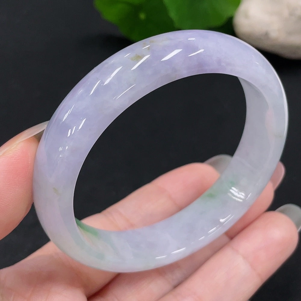 HUILIU HQ jadeite round bangle in size 56, weighing approximately 52.3g, featuring smooth, polished green jade surface.
