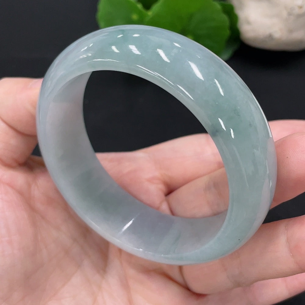 HUILIU HQ jadeite round bangle in size 57, showcasing smooth green jade with a total weight of 80.8g, natural and polished appearance.