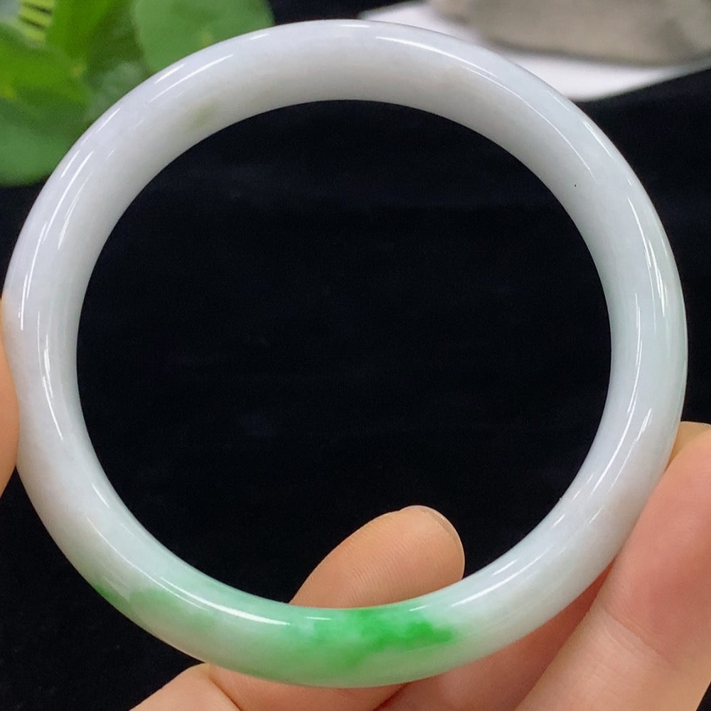 HUILIU HQ jadeite round bangle in size 58.4 with an approximate weight of 57.51g, showcasing smooth, polished jade surface.