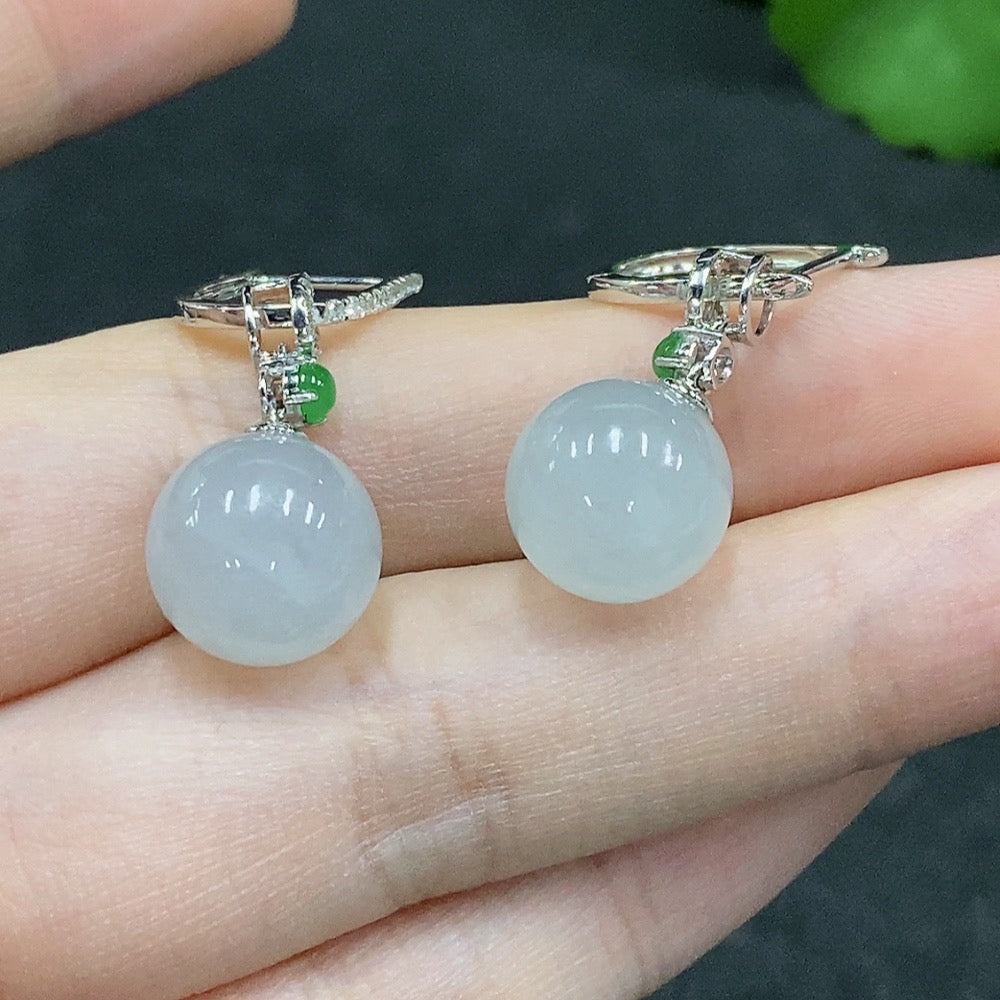 Jadeite round bead earrings by HUILIU HQ with 18K gold accents and diamond details, weight approximately 6.7g.