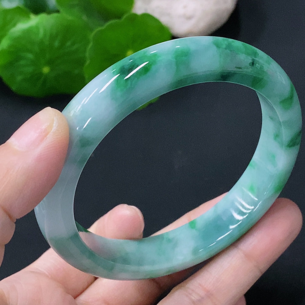 Huiliu HQ jadeite round bracelet featuring smooth polished green jade stones, certified by Huiliu.