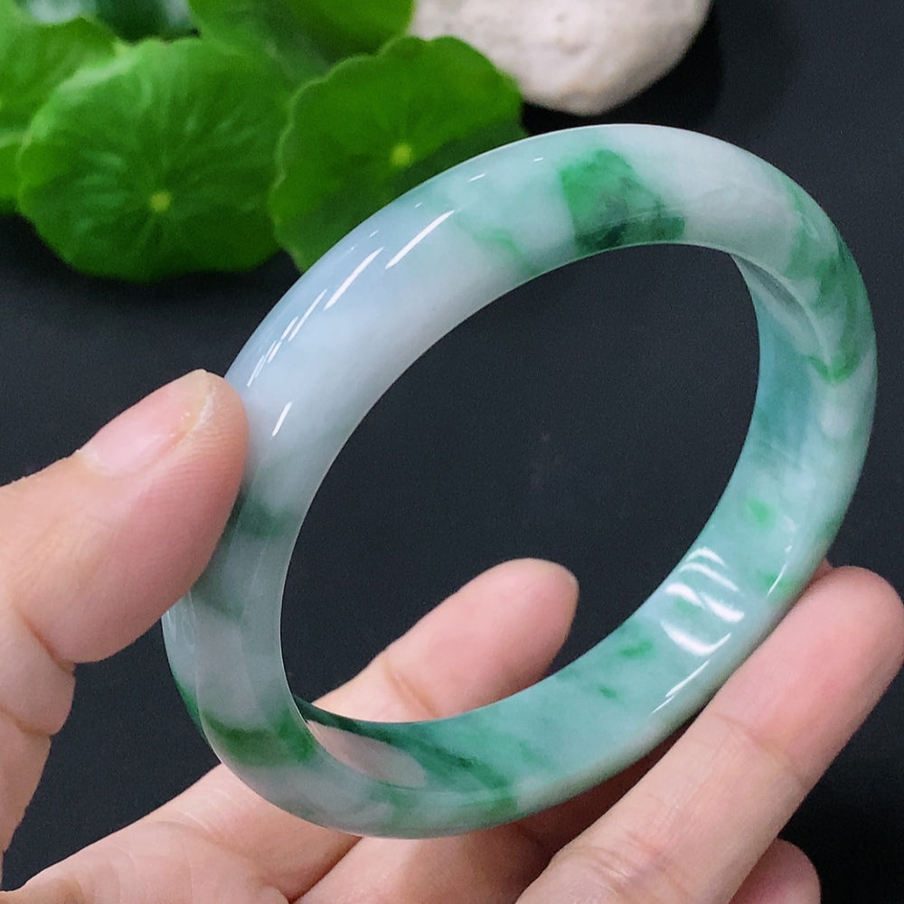 Huiliu HQ jadeite round bracelet featuring smooth, polished jade stones, certified by Huiliu, on a soft white background.