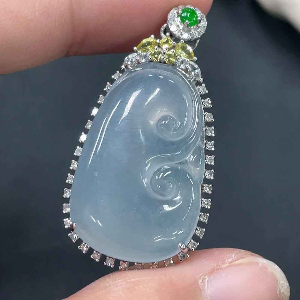 HUILIU HQ jadeite Ruyi inlay piece with 18k gold inlay, weighing approximately 6.93g, featuring intricate jade craftsmanship.
