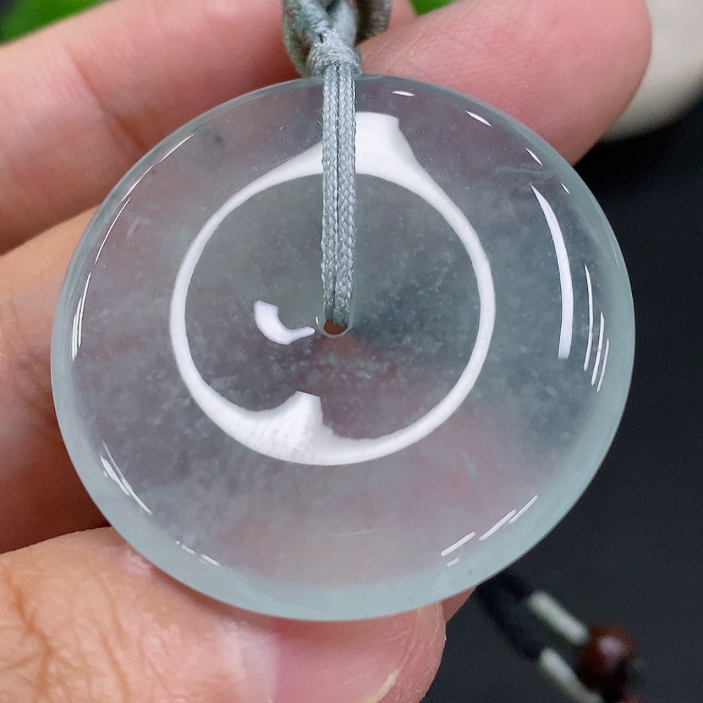 Huiliu HQ jadeite safety buckle with rope, natural green jade, Huiliu certified, showcasing the polished jade buckle and attached rope.