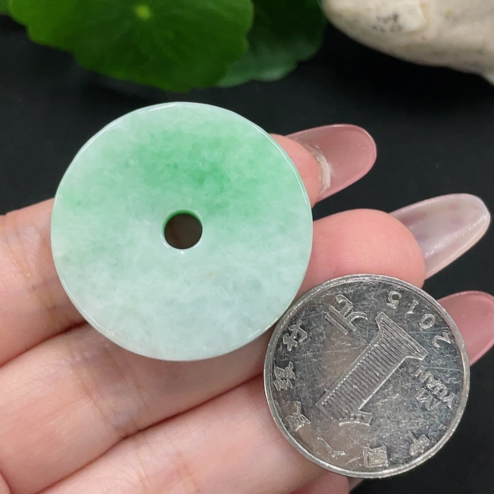 HUILIU HQ jadeite safety buckle pendant with carved design, weighing approximately 15.9 grams, showcasing smooth green jade.