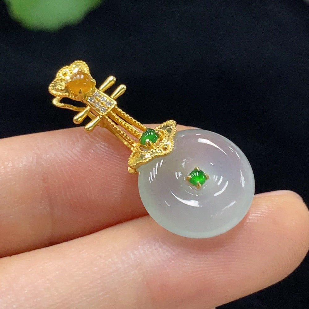 Jadeite safety buckle pendant with 18K gold from HUILIU HQ, showcasing a polished jade piece with gold accents, 3.24g.
