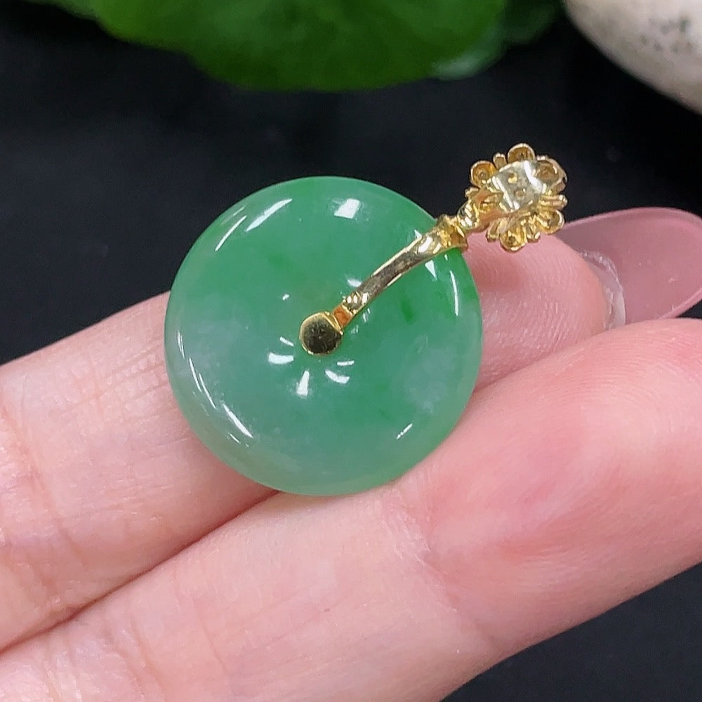 HUILIU HQ jadeite safety pendant with 18K gold and diamond accents, showcasing a polished green jade stone and elegant design.