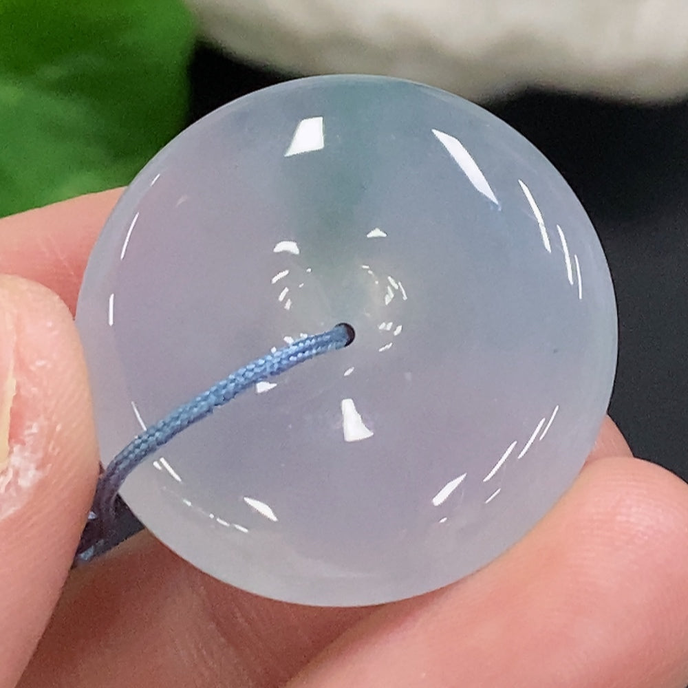 Huiliu HQ Jadeite Safety Pendant made of green jade, featuring a smooth, polished surface with a protective safety design.