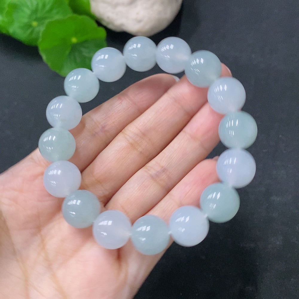 HUILIU HQ Jadeite bead bracelet with 12.5mm beads, approximately 52.43g, showcasing smooth, polished jade stones.