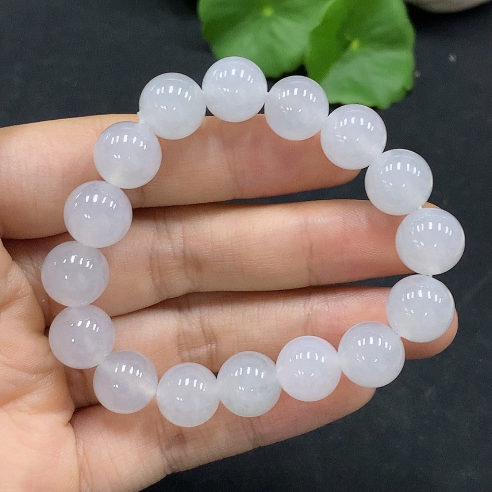 HUILIU HQ jadeite bracelet with 10.9mm beads, approximately 35.6g, featuring smooth, polished jade stones on a string.