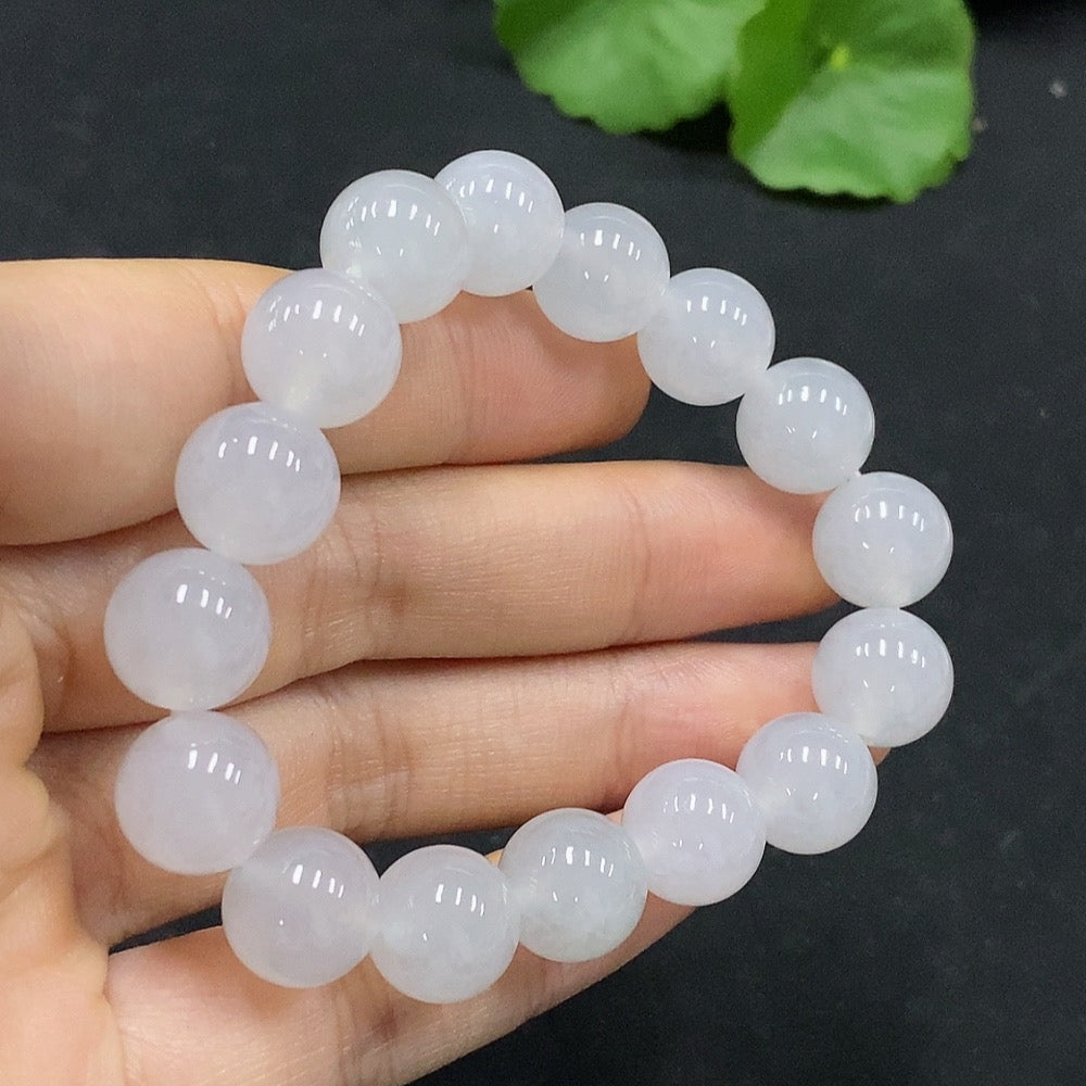 HUILIU HQ jadeite bracelet with approx. 10.9mm beads, weighing about 35.6g, showcasing smooth green jadeite stones.