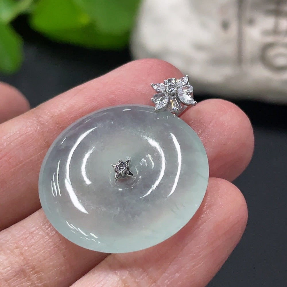 Jadeite Peace Knot Pendant from HUILIU HQ, showcasing a carved jade pendant with a traditional peace knot design.