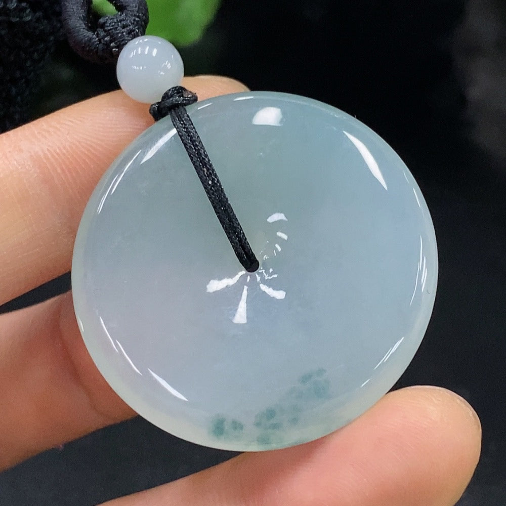 HUILIU HQ Jadeite Peace Pendant featuring a smooth, polished jadeite stone with carved peace symbol design.