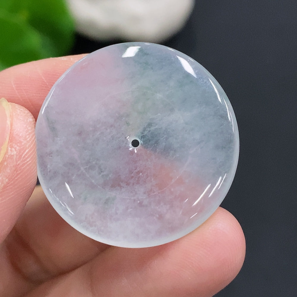 HUILIU HQ jadeite peace pendant in green jade, approximately 6.6g, featuring a smooth polished surface and intricate carved design.